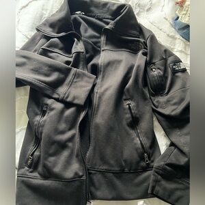 The North Face Black Softshell with Sleeve Patch